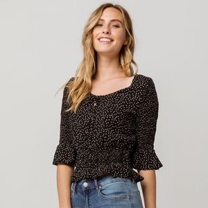 Ivy & Main Black and White Smocked Polkadot Top
